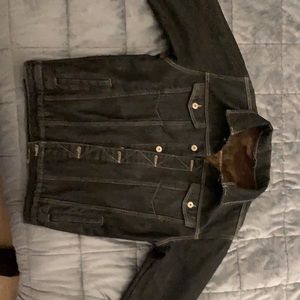 Black denim/jean jacket.  Soft brown fur-like lining.